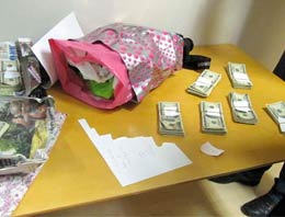 Araçtan binlerce doları böyle savurdu